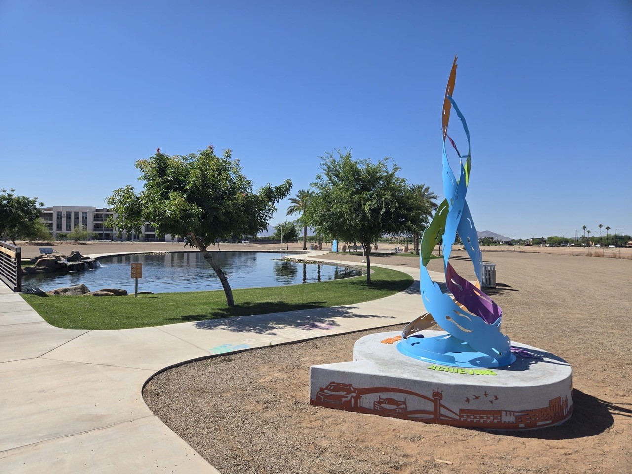 The Flame sculpture on its round base